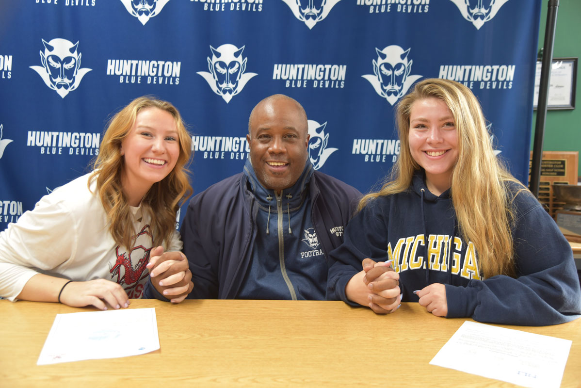 Holly Wright (left) with high school  coach Todd Jamison and Michigan bound teammate Maya Santa-Maria 