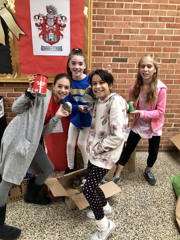 The STEM student council members are proud to have collected food to feed local hungry families 