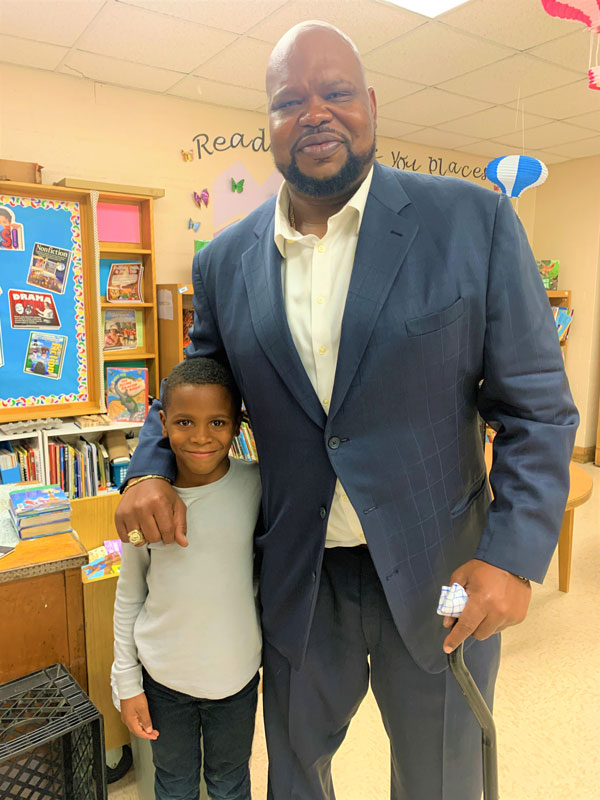 Gary Brown met third grader Jeremiah Lacen during his visit to Flower Hill School.