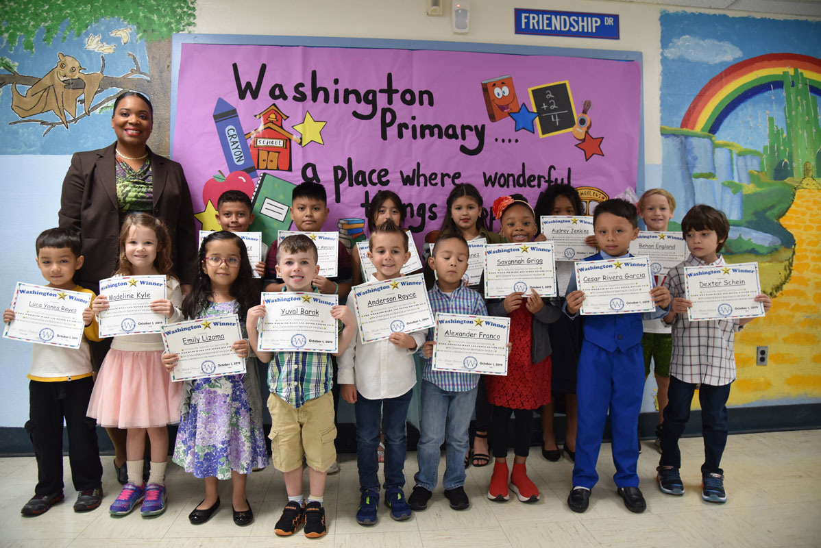 Principal Michelle Richards with September's Washington Ways Award recipients 