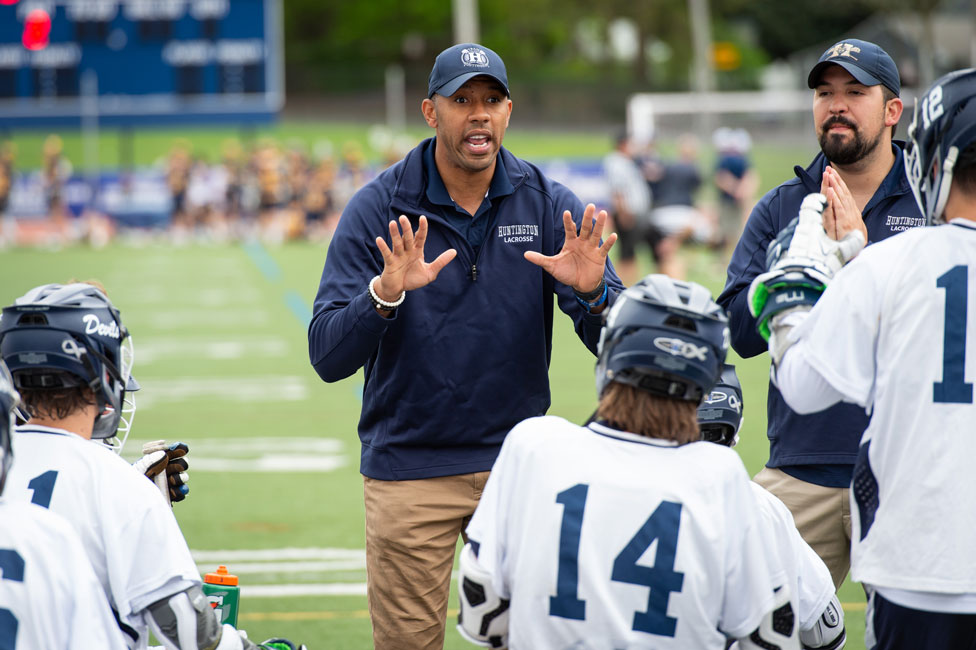 Julian Watts with the Huntington varsity boys' lacrosse team. (Darin Reed photo)