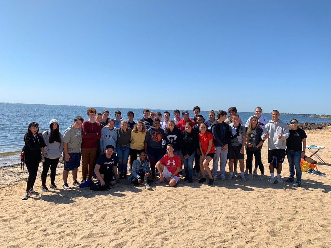 Huntington AP Environmental Science students on the beach at Great South Bay.