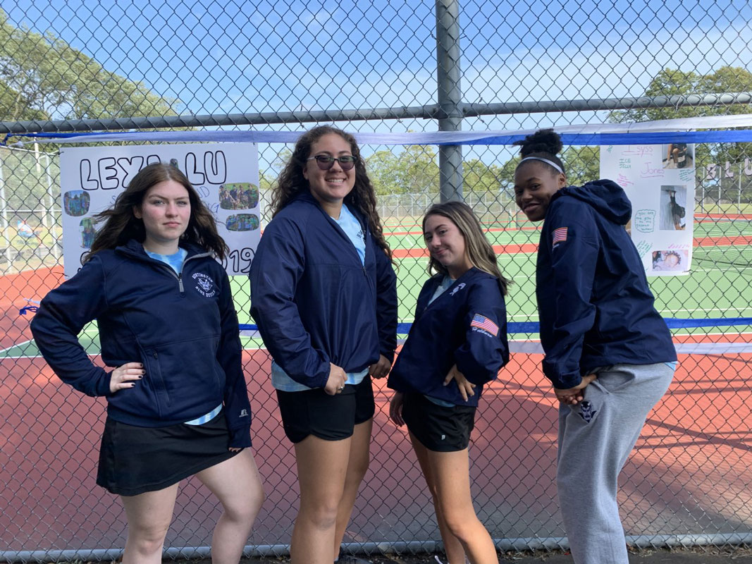 Huntington girls' tennis seniors Paige Mangan, Caitlin Palermo, Lexi Helburn and Isyss Jones.