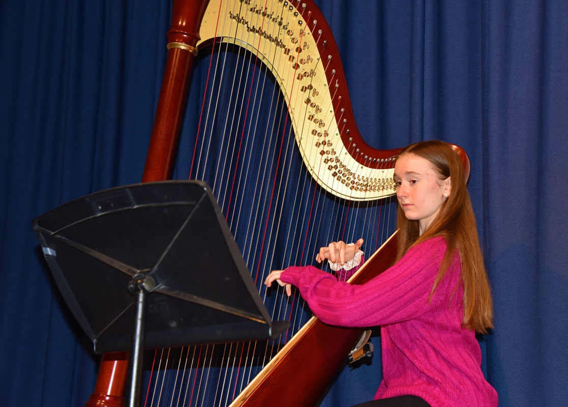 Harpsichordist Mary Grace Rorke performed a lovely selection for trustees in honor of School Board Recognition Week
