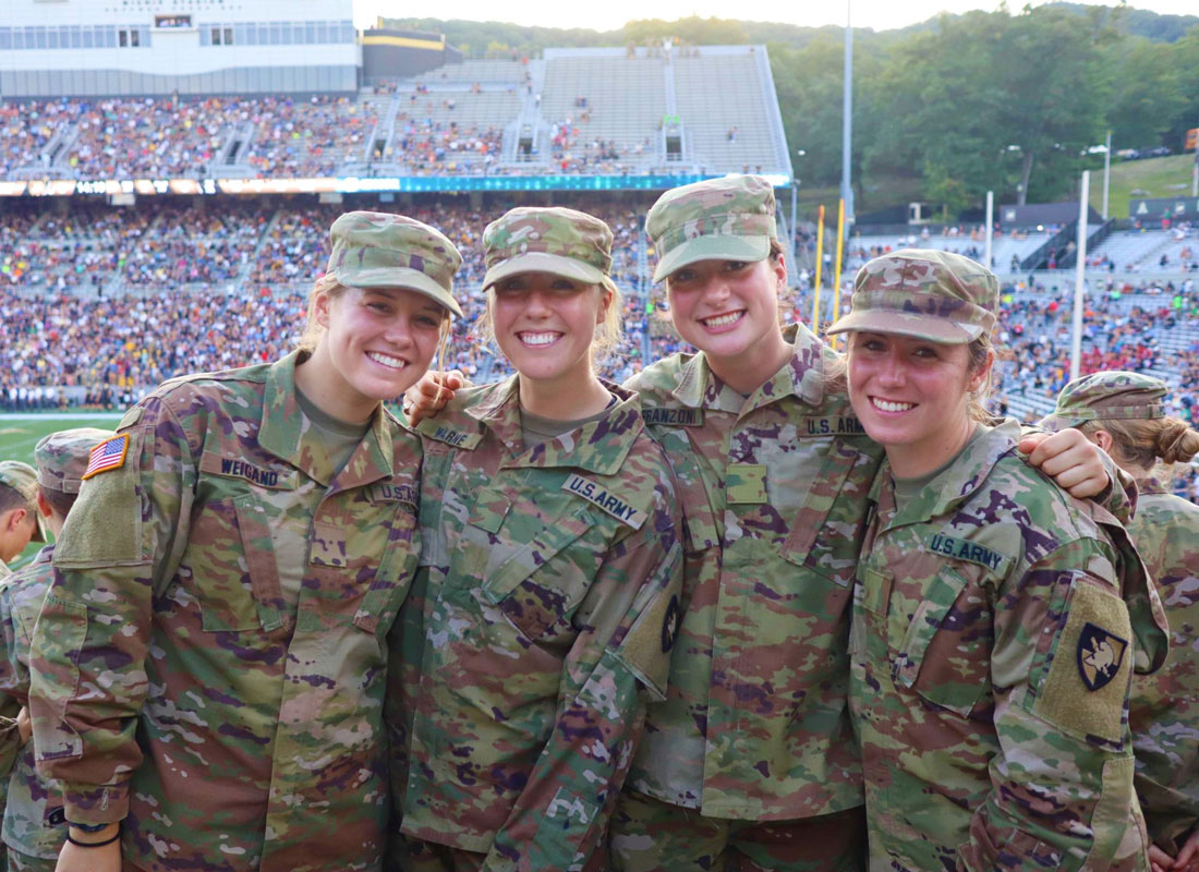 Huntington alum Paige Lennon (right) with fellow West Point cadets.