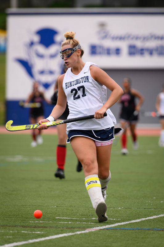  Senior Megan Byrnes with the ball for Huntington. (Darin Reed photo) 