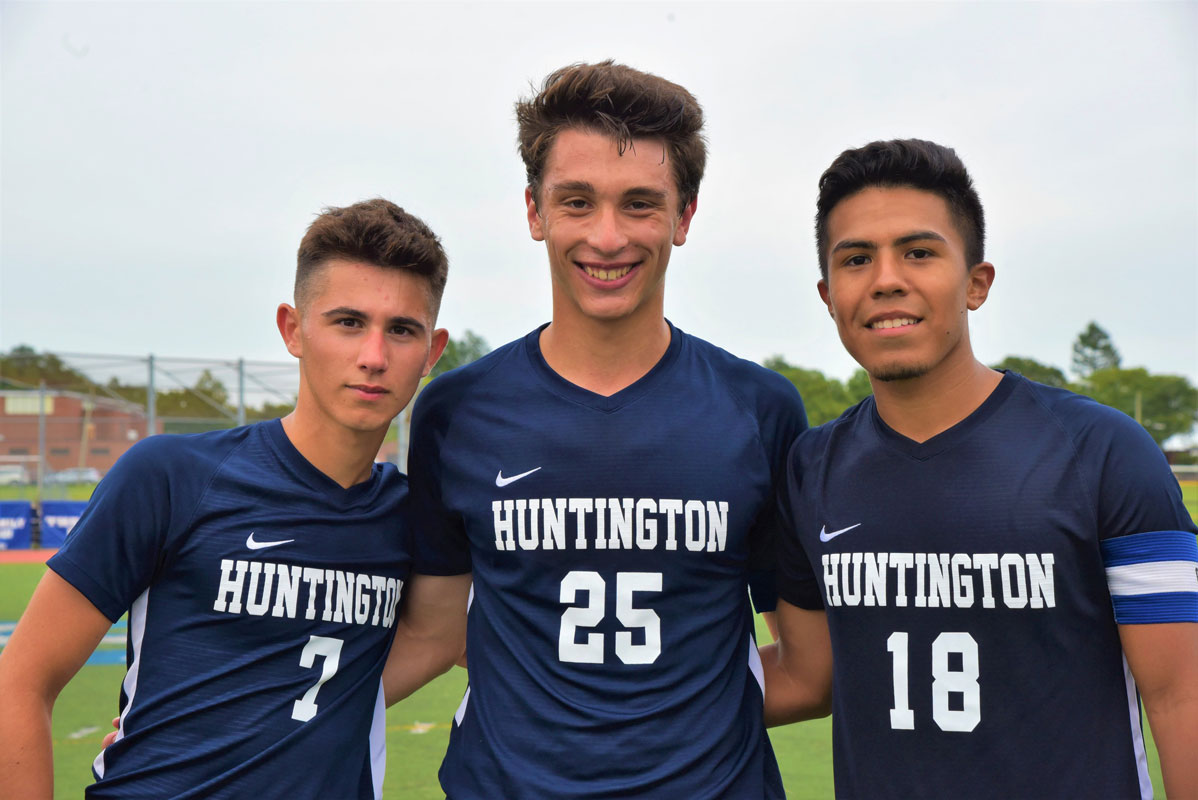 Huntington varsity boys' soccer captains Carmine De Ieso, Julien Rentsch and Brian Contreras)