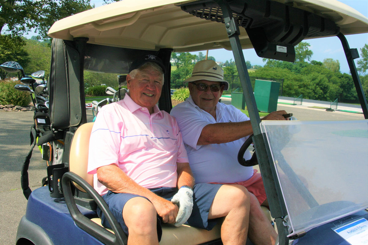 1950s era Huntington High School alums Charlie Forte and Pete Sansiviero played in the Booster Club golf outing.