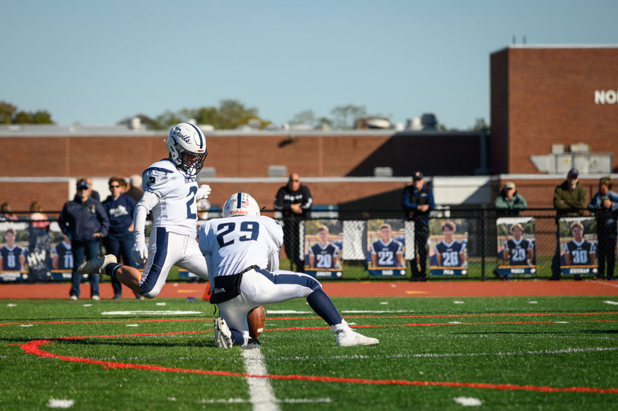Aedan McDonald successfully converted three extra points for the Blue Devils with Lex Colato holding. (Darin Reed photo.)