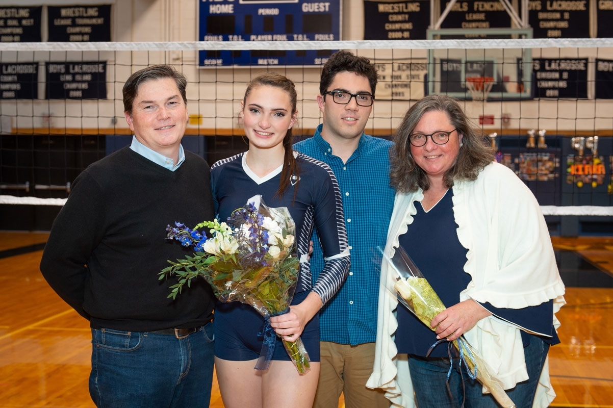 Blue Devil star Cat Jamison with her family on Senior Day. (Darin Reed photo.)