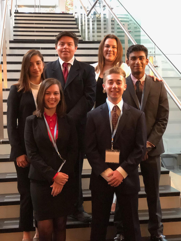 CEO Abigail Holmes (front left) and fellow Titan VE company executives.