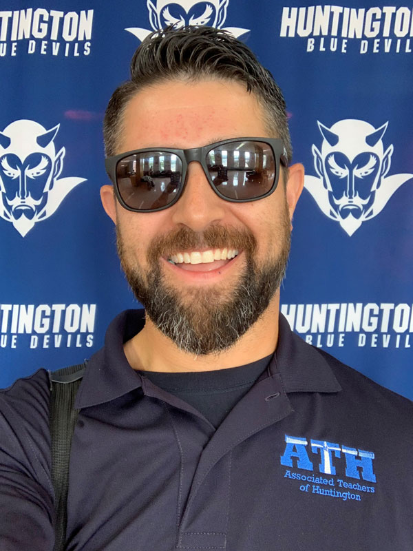 Huntington High School science teacher Joe Cohen hams it up for a photo.