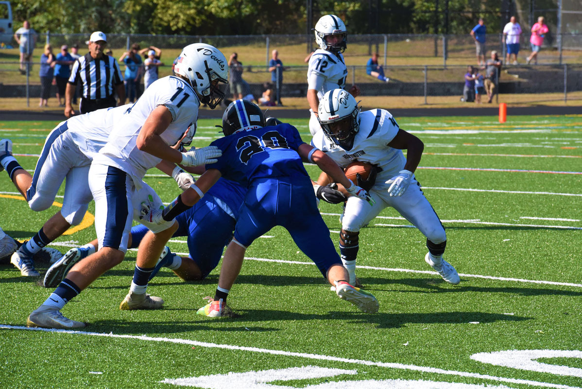 Nasir Youngblood has the ball for the Blue Devils.