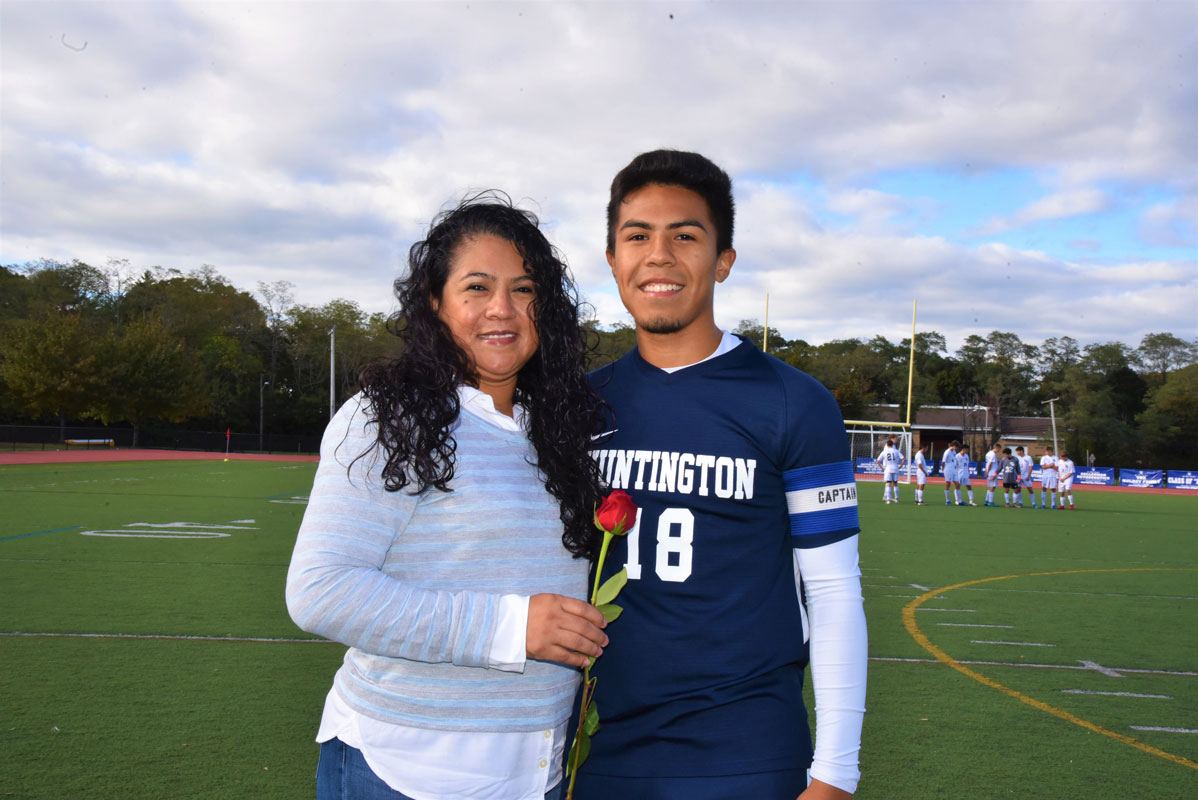 Huntington soocer great Brian Contreras with his mom, Claudia on Senior Day at Blue Devil Stadium.