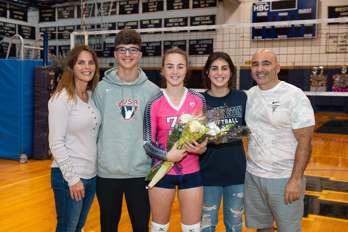Isabella Toscano with her family on Blue Devil girls' volleyball Senior Day. (Darin Reed photo.)