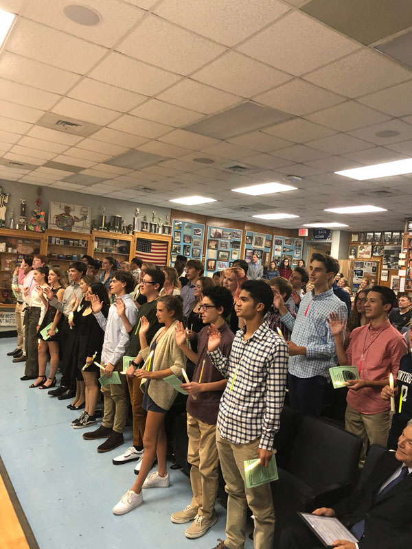 Huntington's Science Honor Society inducted 42 new members on Wednesday night.