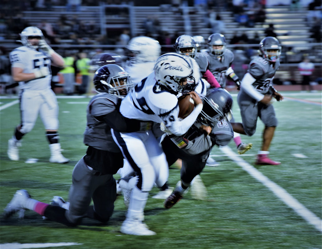 It took two Deer Park tacklers to bring down Lex Colato last Friday night.