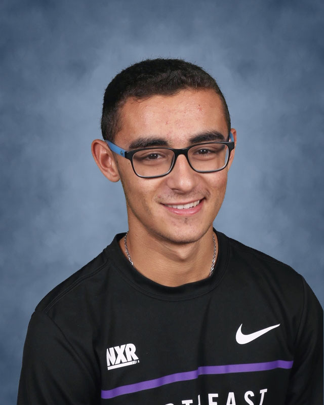 Aidan Heller leads the Huntington boys' cross country team.