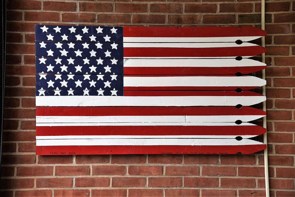 A wooden American flag on display in the Washington School lobby.