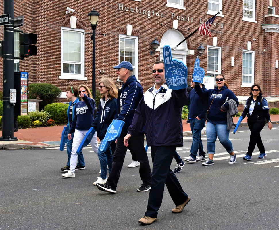 Superintendent Jim Polansky leaves no doubt he feels Huntington is No. 1 as he marched in last year's parade.