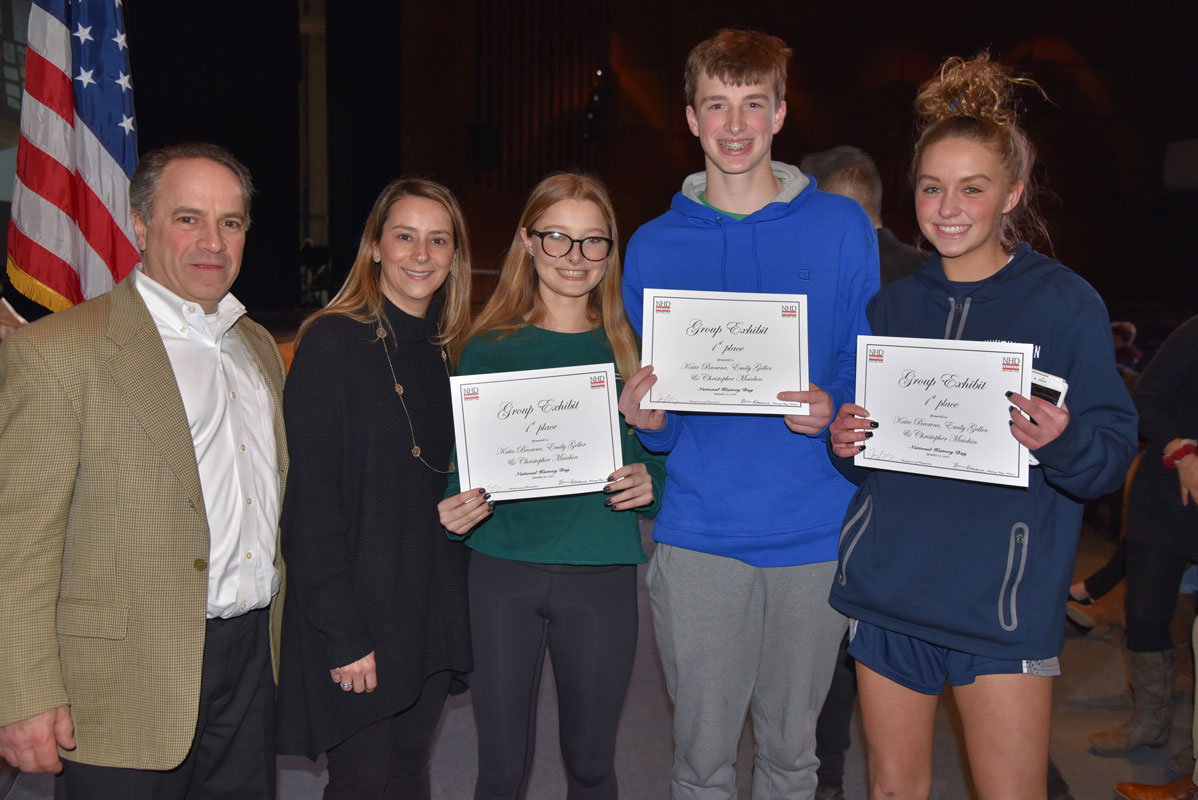 Humanities Chair Joe Leavy and teacher Lauren Desiderio with the three research partners at the awards ceremony.