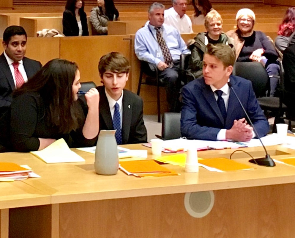 John Panos (right) was a key attorney with Huntington's county champion mock trial team in 2018.