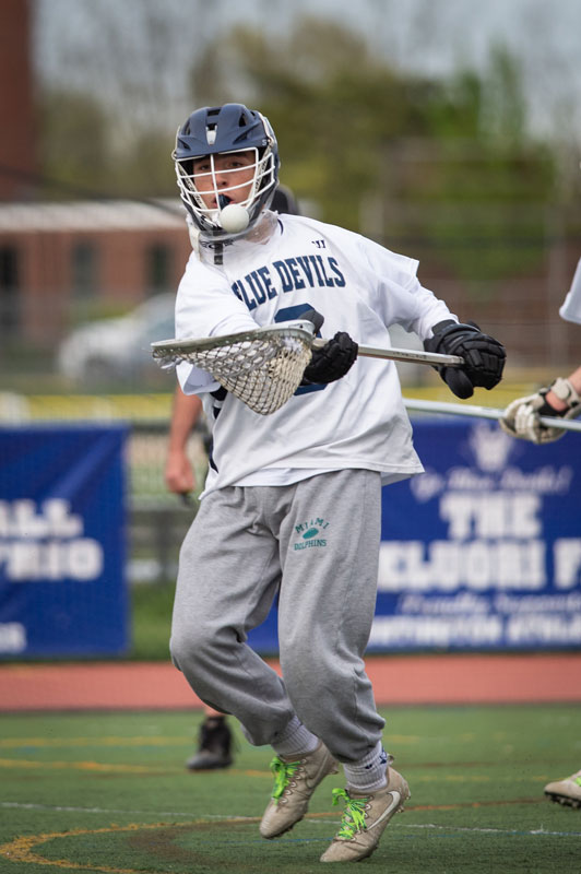 Senior Aedan McDonald is the lacrosse team's splendid goalie. (Darin Reed photo.)