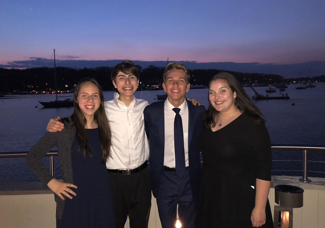 John Panos (second from right) with fellow Huntinton mock trial team leaders through the years.