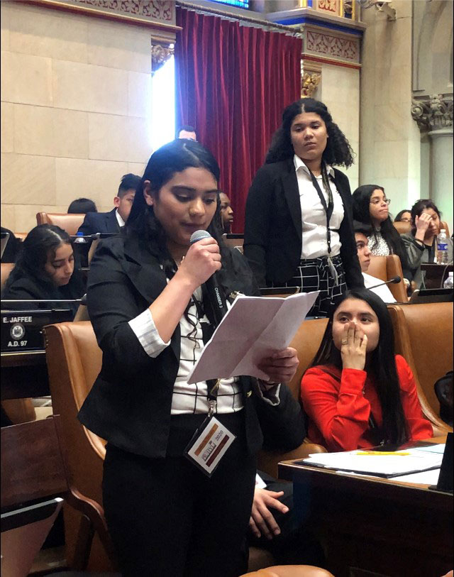 Huntington junior Yolani Cabrera speaks on the floor of the State Assembly in Albany.