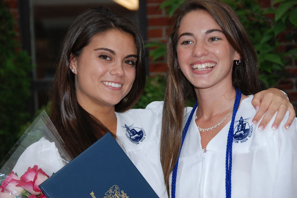 Courtney O'Bryan (right) with classmate Alexandra Krapf on graduation day in June 2011.