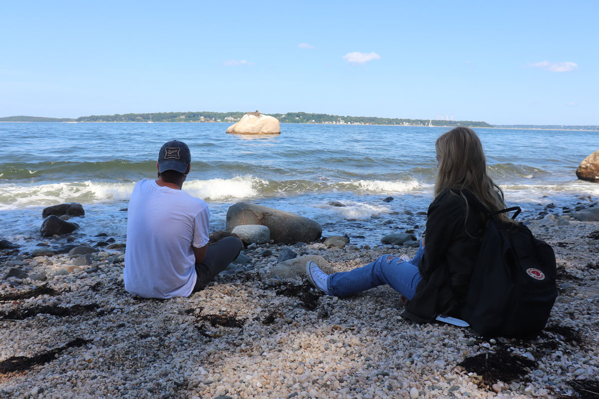 Actors Chris Maichin and Emily Geller on the set of the film overlooking Target Rock.