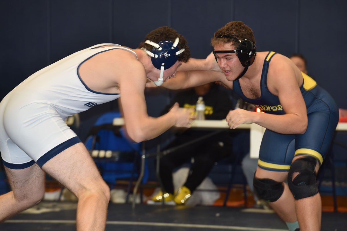 Huntington junior Nick Tudisco (left) in action in the season opening tournament.