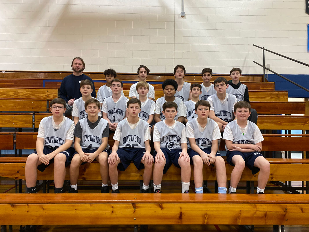 Finley boys' basketball coach Timothy Madden with his team that went 6-4.