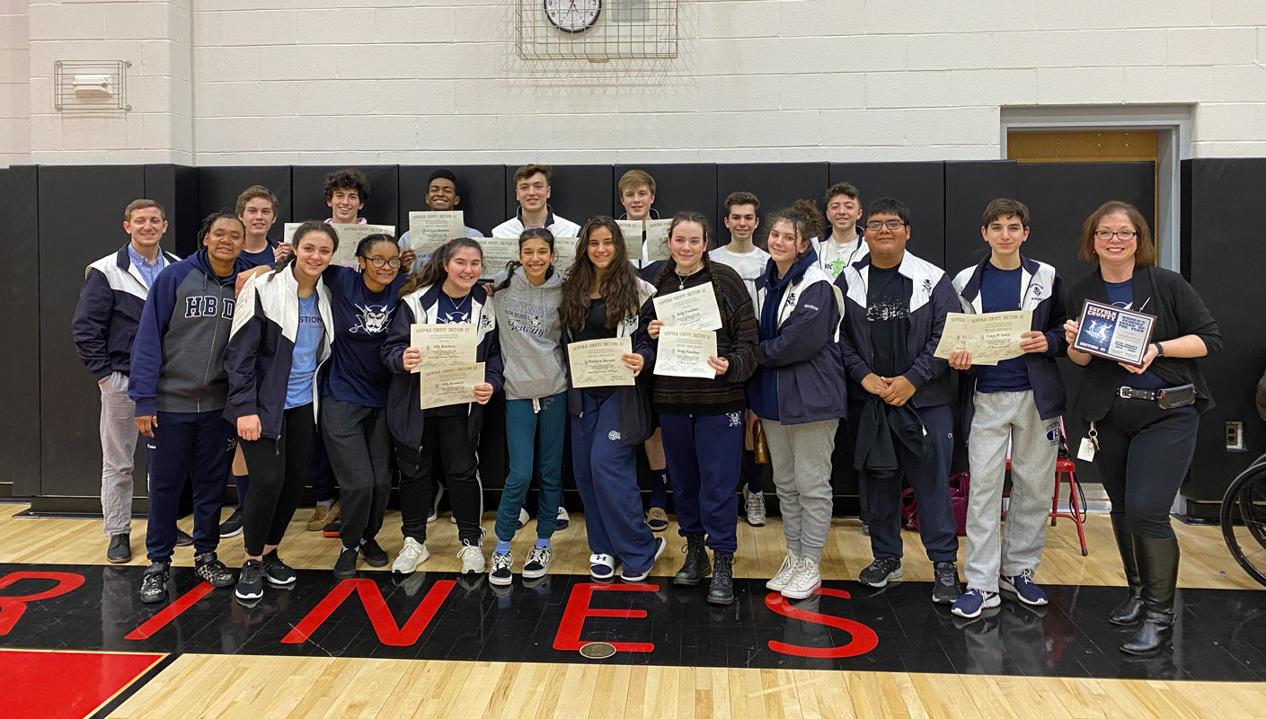 The Blue Devil boys' and girls' teams at the county championships at Newfield.