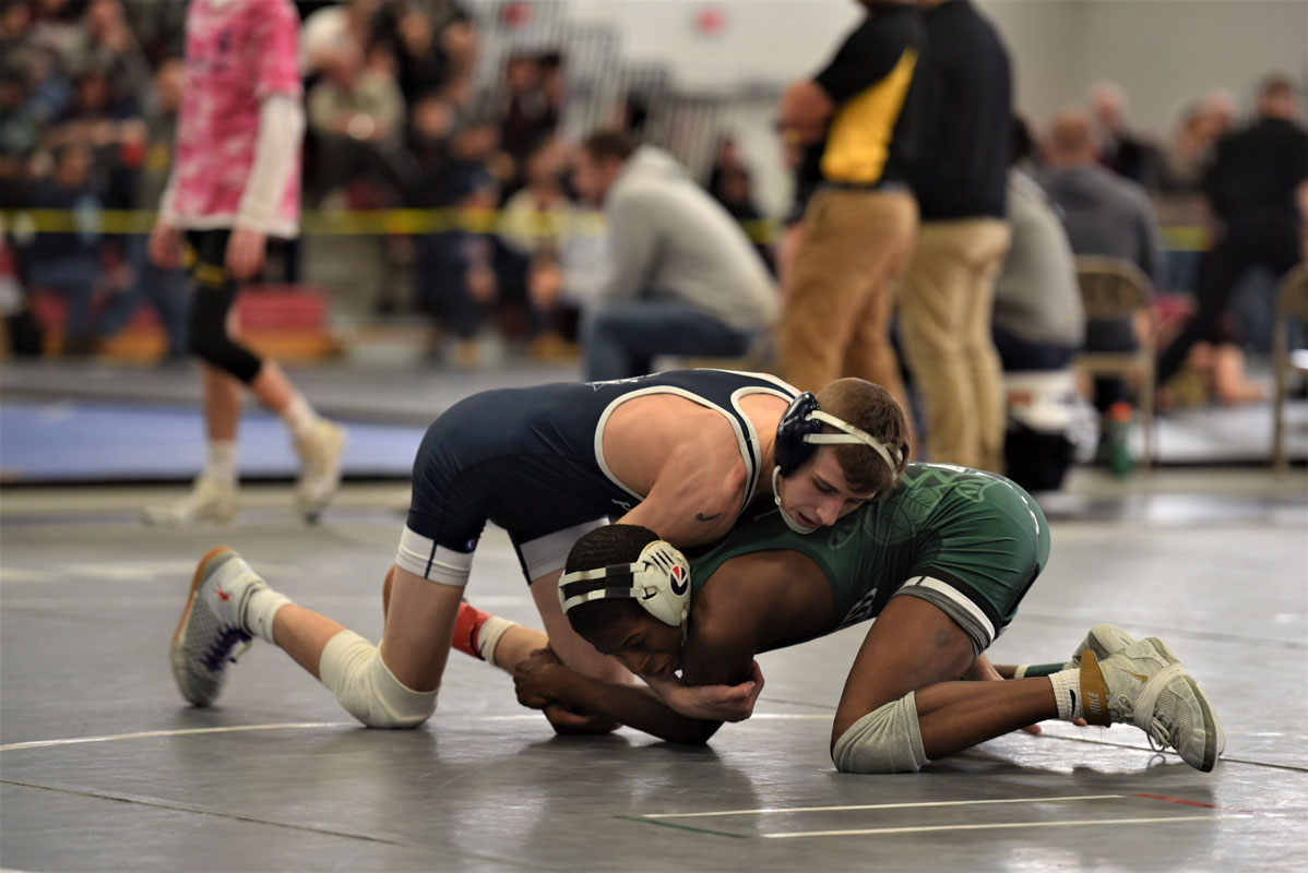 Joe Petrone (top) has his foe all locked up in the county championships.  