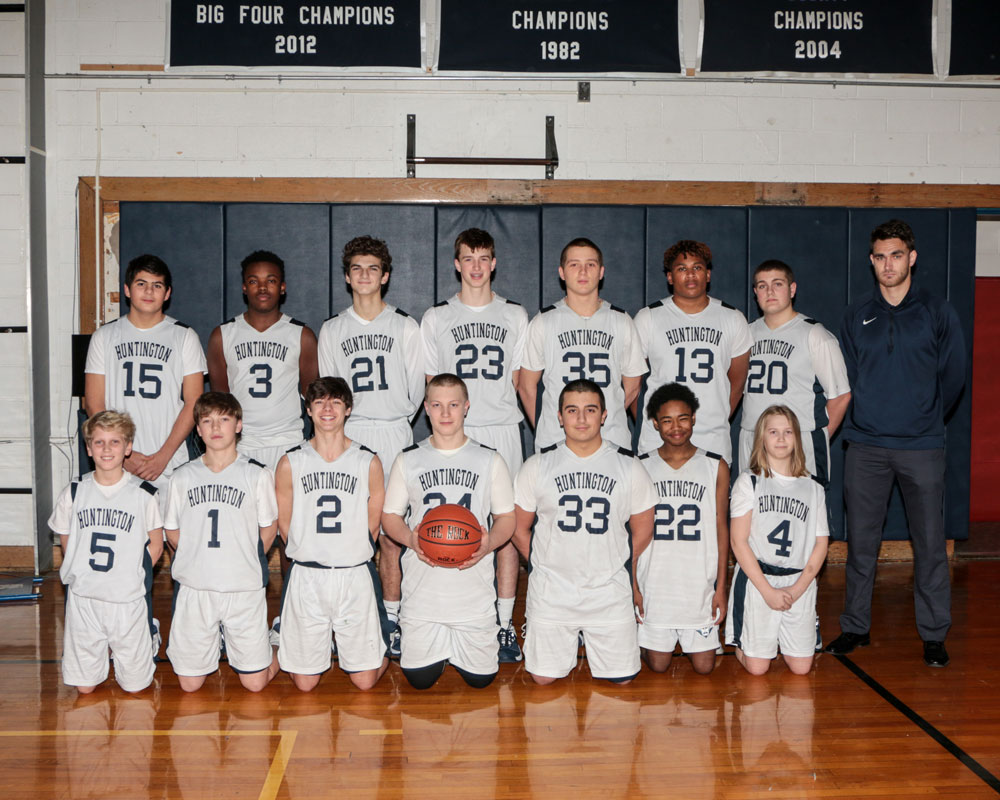 The Huntington junior varsity boys' basketball team with head coach Patrick Reilly.