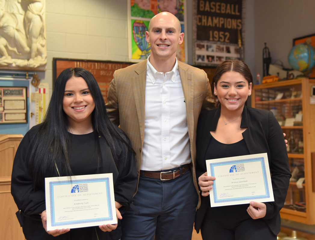 Social Studies Honor Society faculty advisor Ken Donovan with Kimberly Valle and Britney Guardado
