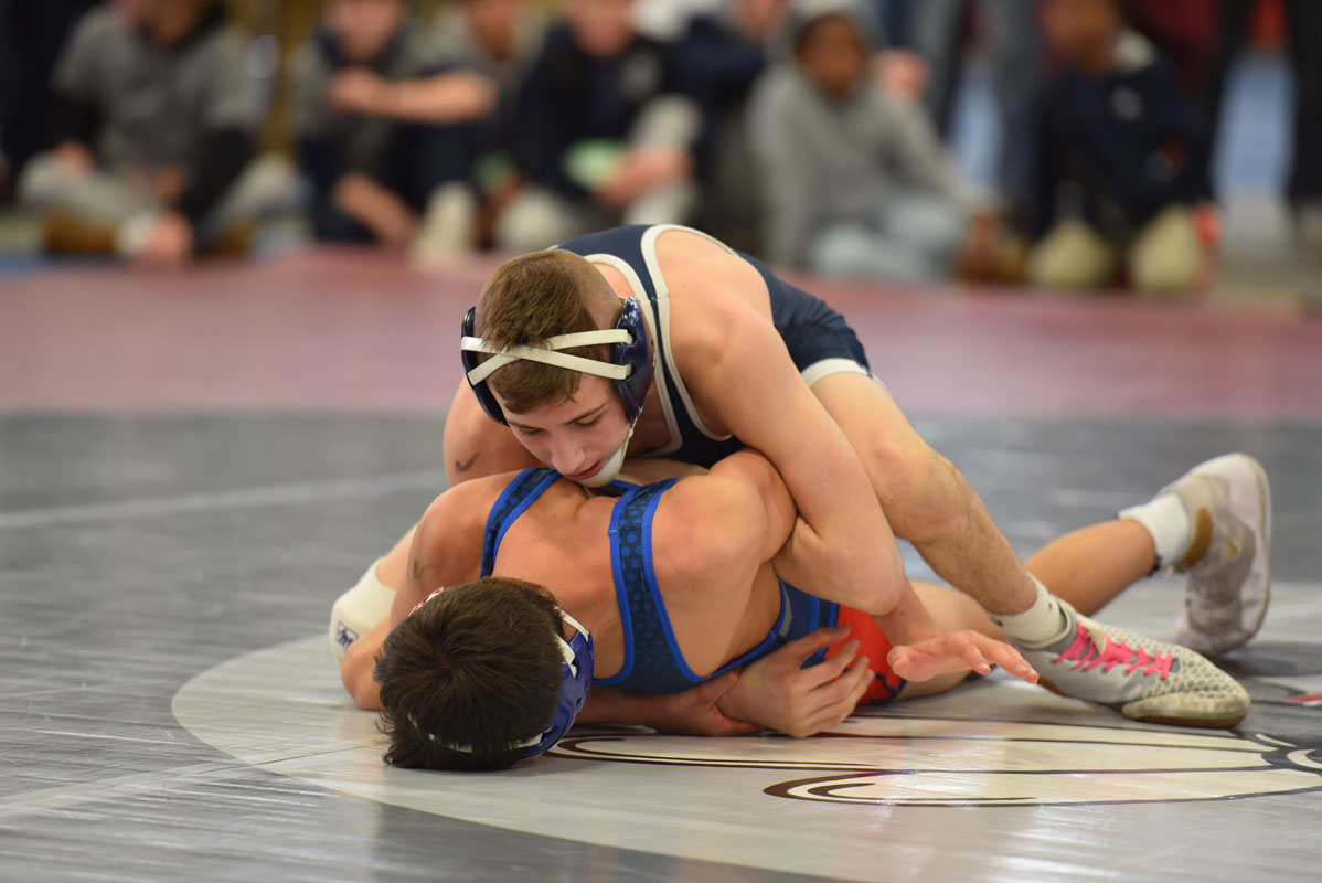 Huntington junior Joe Petrone (left) won three matches in the Suffolk championships