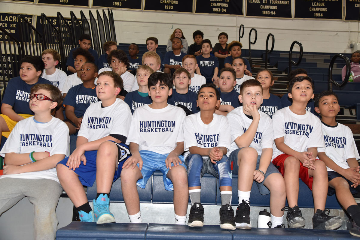 The Woodhull and Jack Abrams STEM Magnet School players sat together during the first half 