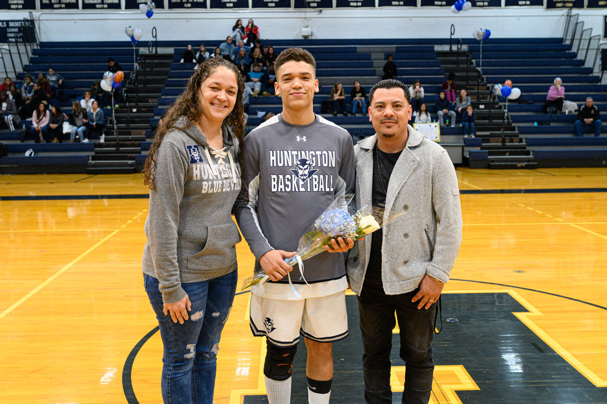 Huntington senior Lex Colato and his parents, Desiree and Alex on Blue Devil Senior Night. (Darin Reed photo.)