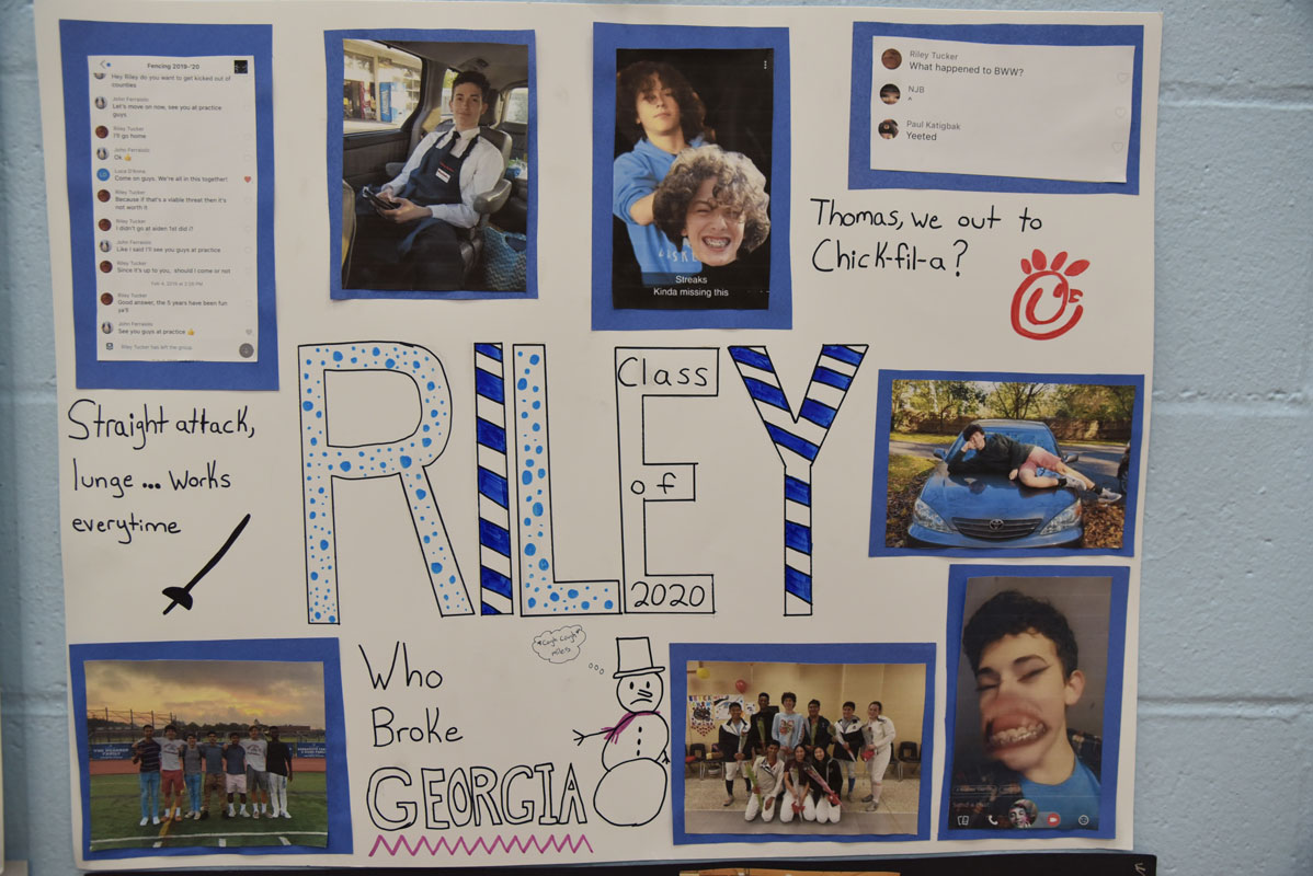 Posters celebrating the career of each senior were affixed to the gym wall.