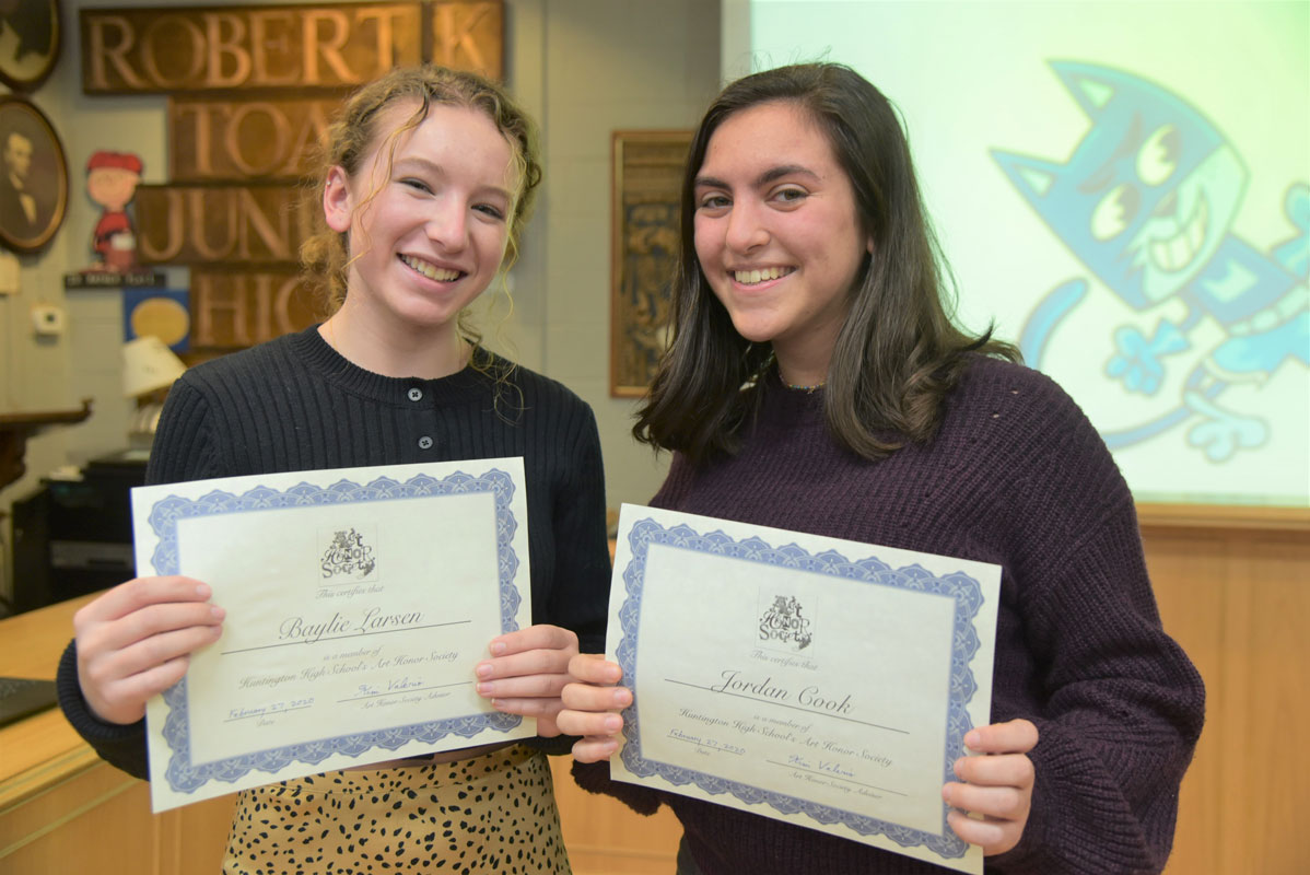 New Art Honor Society members Baylie Larsen and Jordan Cook.