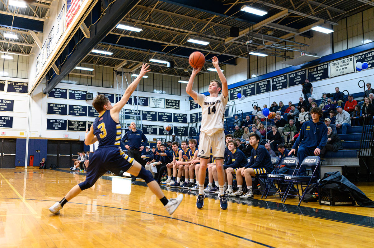 Sophomore Kevein Drake launches a three-point shot. (Darin Reed photo.)