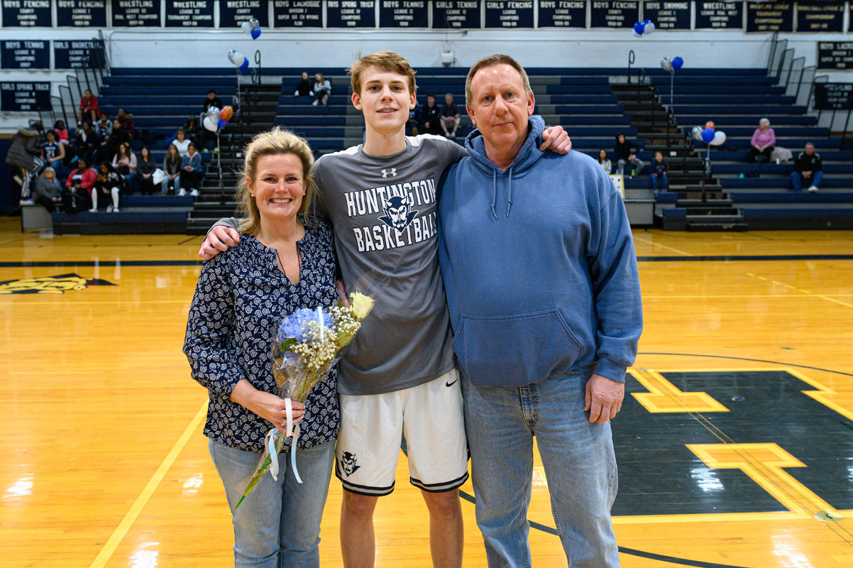 Michael Wright and his parents, Karla and Mike on Blue Devil basketball Senior Night. (Darin Reed photo.)