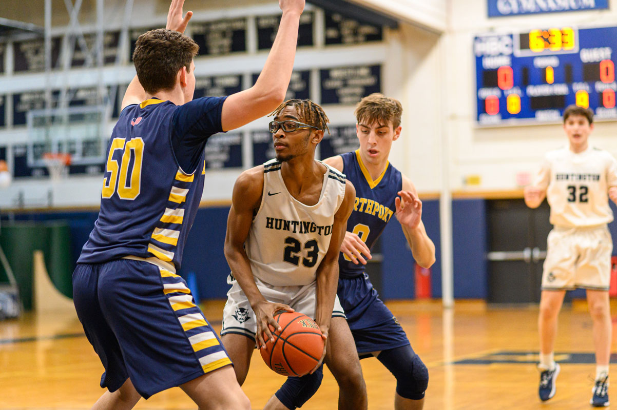 Senior Omari Stephen gets double-teammed. (Darin Reed photo.)