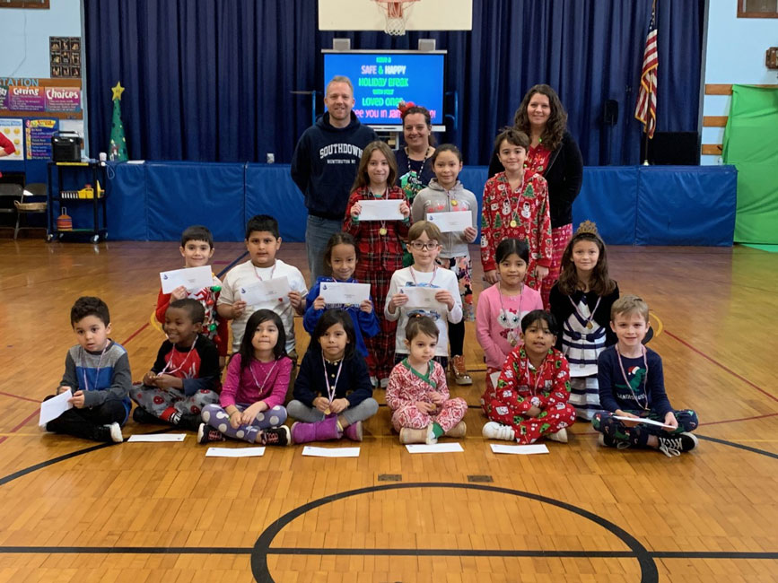Principal Scott Oshrin in the gymnasium with Southdown School Splash Award recipients