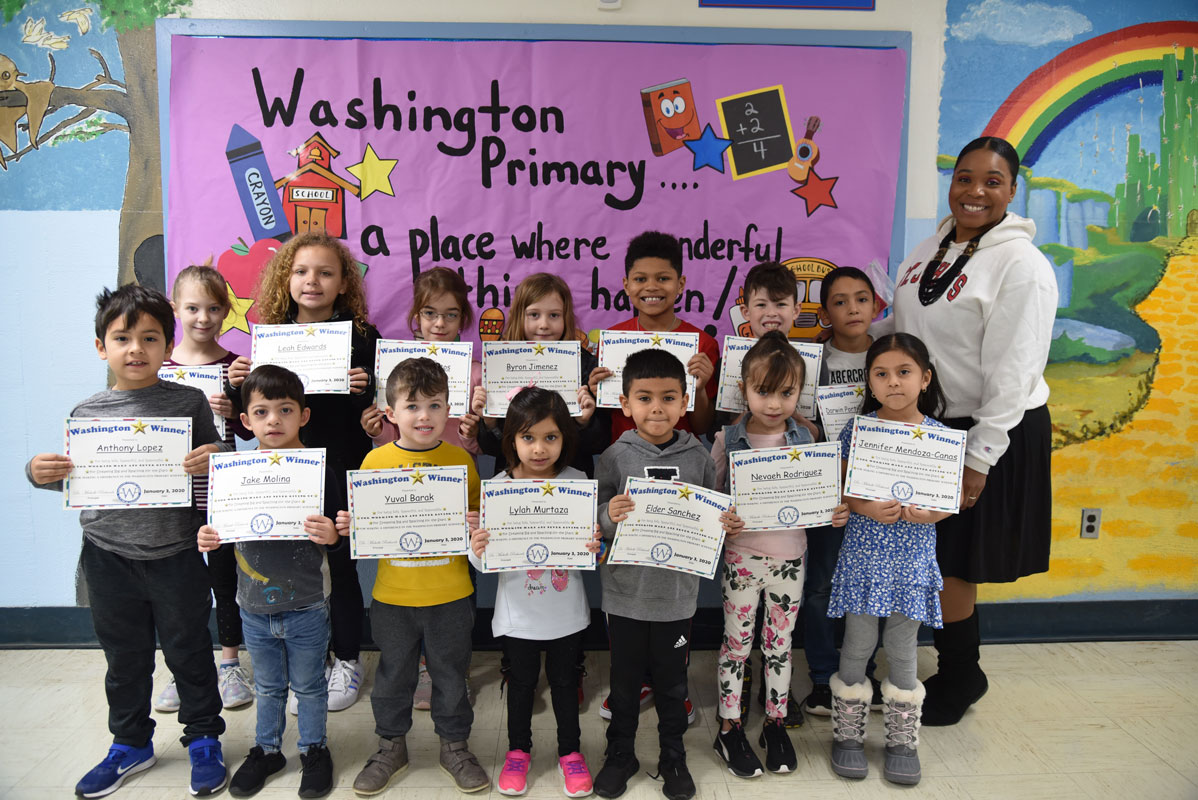 Principal Michelle Richards with December's Washington Ways Award recipients 