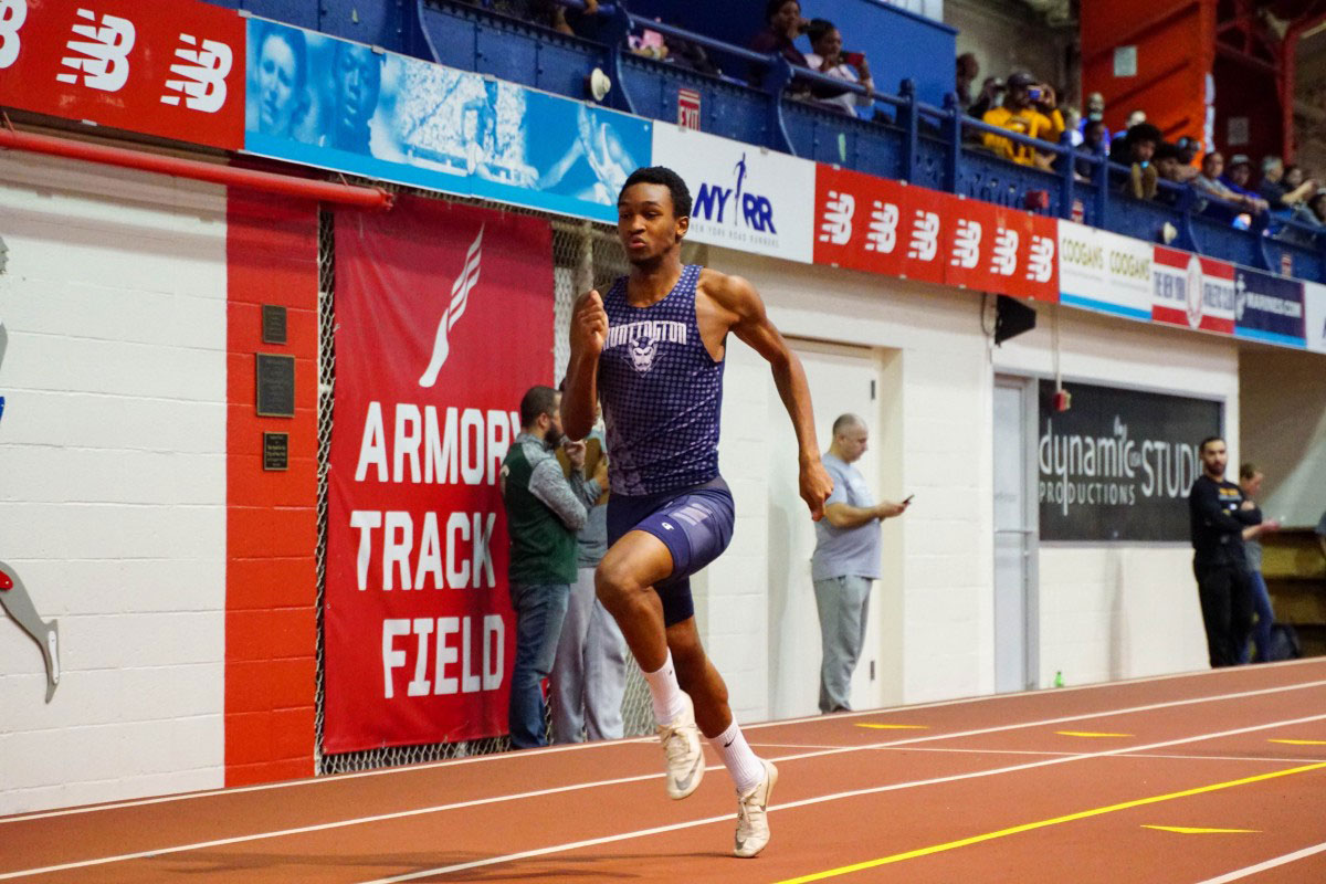 Anthony Joseph en route to a second place finish in the invitational 300m dash at the Stanner Games.