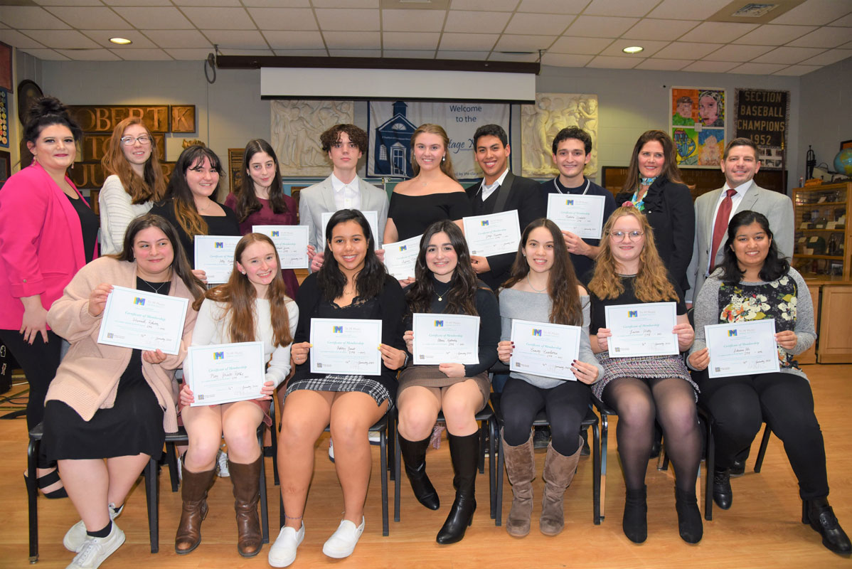 The Tri-M Music Honor Society  inducted 16 new members last week (2)