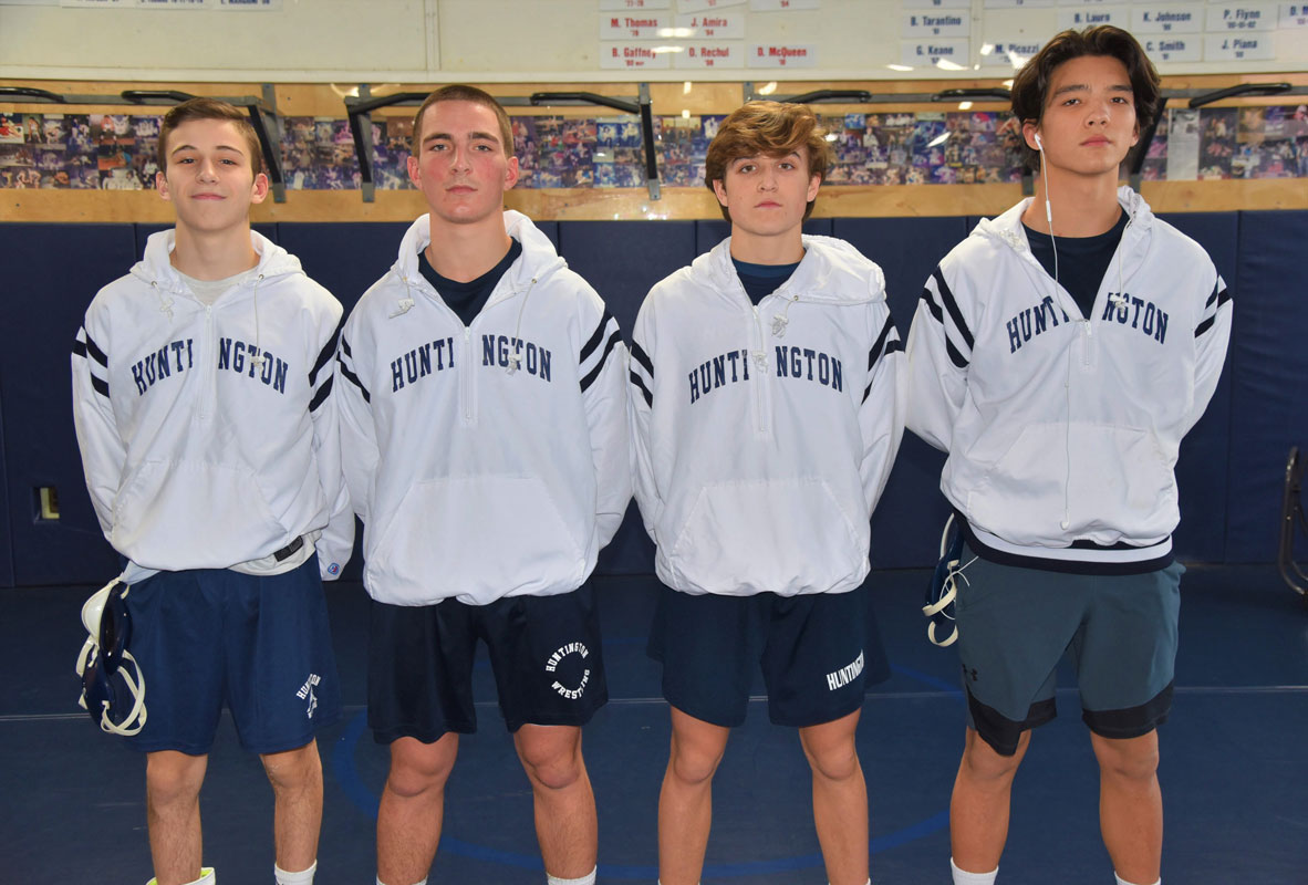 Huntington wrestling captains Joe Petrone, Aedan McDonald, Billy Burton and Joe Nicotra.